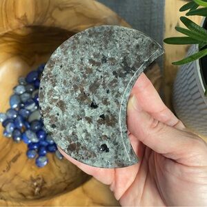 Yooperlite polished crystal moon carving. UV reactive.